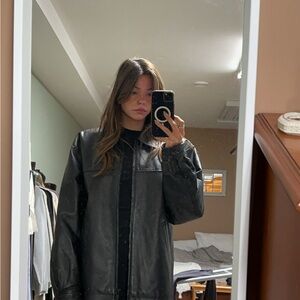 Black Leather Jacket with Oversized Fit and High Collar
